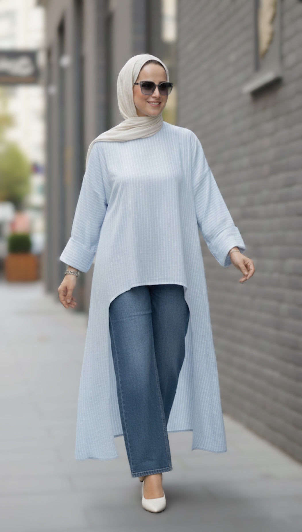 • Design: Ultra-modern asymmetric cut, featuring a shorter front hem and an elongated back for a flowing, regal movement.