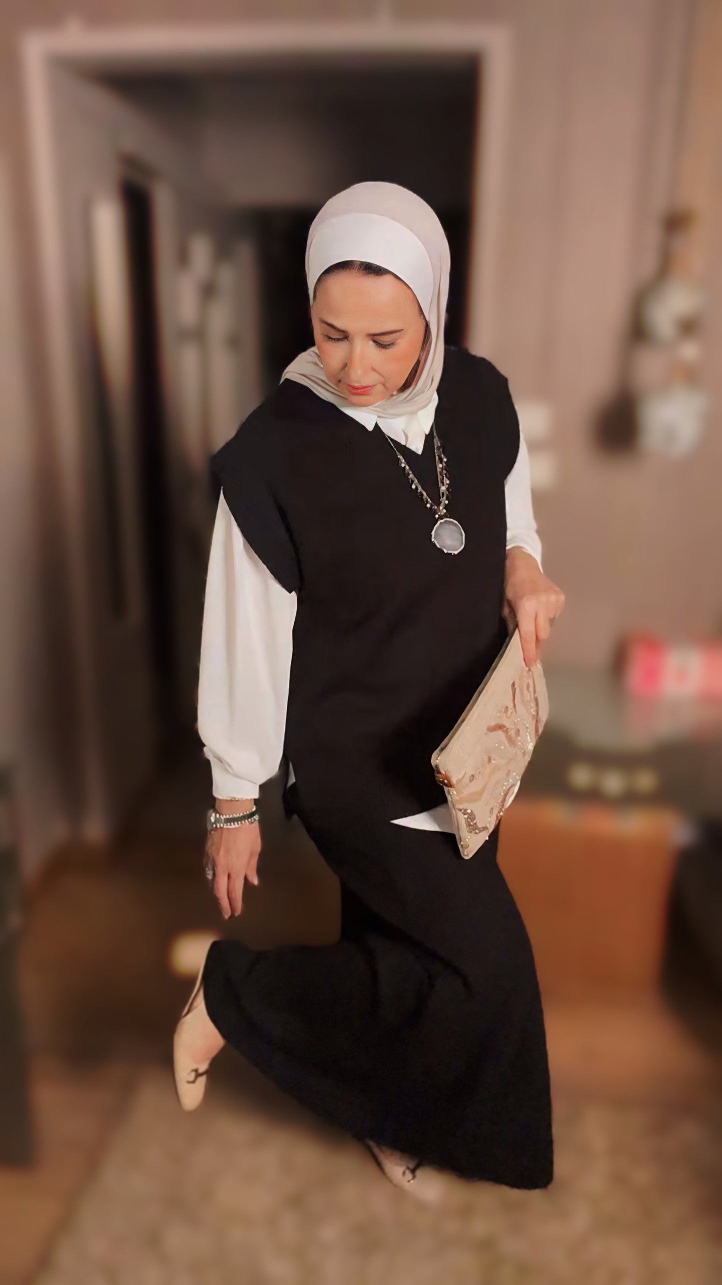 Style: Casual and versatile, suitable for layering